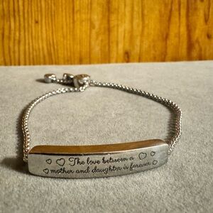 The Love Between a Mother and Daughter is Forever Adjustable Bracelet